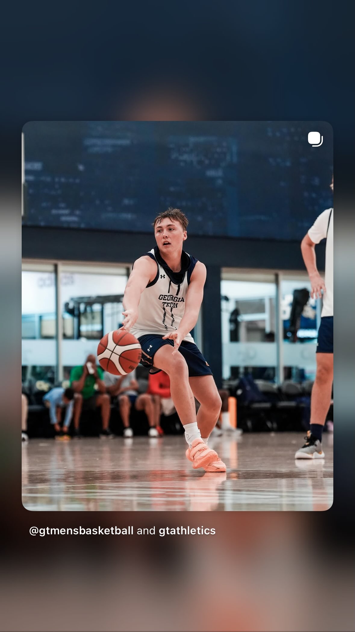 A young basketball player competing on the court